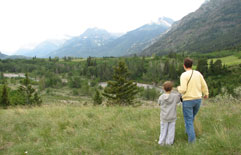 Mother and child looking at Waterton Biosphere Reserve